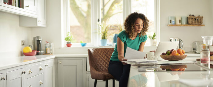woman looking at solicitor paperwork